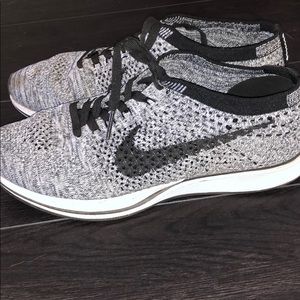 Women Nike Flyknit Racer. Size 7